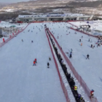 XAPJ8DA1VGDZO7D52G41 - 🌍NewspaperAmigo – Your Global News Buddy 🗞️ China Skis Past Switzerland in Winter Tourism Race 🎿 video poster