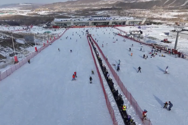 China Skis Past Switzerland in Winter Tourism Race 🎿 video poster