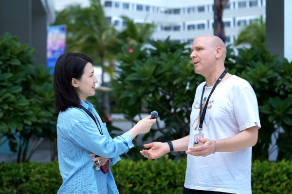 German Composer Praises Chinese Filmgoers at Hainan Festival 2025 🌴🎬 video poster