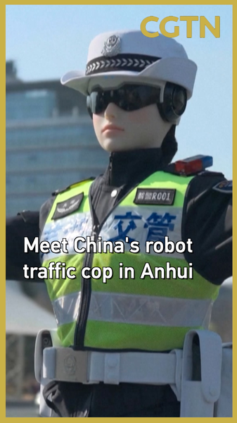7VGR6CEBHMHFFGZU02FT - 🌍NewspaperAmigo – Your Global News Buddy 🗞️ China Deploys AI Traffic Robot in Anhui 🚦🤖 video poster