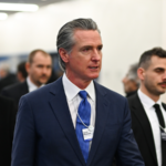 8G9UQTFMI0KOZMUW5IVU - 🌍NewspaperAmigo – Your Global News Buddy 🗞️ Newsom Claims Trump Blocked His Davos Speech Amid Tensions 🌍🗣️