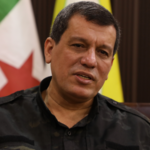 DX7NA6H8BQVX1HPXTF0K - 🌍NewspaperAmigo – Your Global News Buddy 🗞️ SDF Chief Heads to Damascus to Seal Historic Syria Deal 🌍✍️