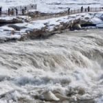VA0VBPEFFU5G4PFC69HB - 🌍NewspaperAmigo – Your Global News Buddy 🗞️ Winter Wonder: Hukou Waterfall’s Snowy Spectacle in 2026 🌨️💧 video poster