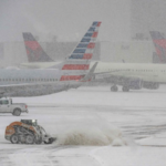 Winter_Storm_Chaos__14_Dead__Thousands_of_Flights_Grounded_in_U_S_ - 🌍NewspaperAmigo – Your Global News Buddy 🗞️ Winter_Storm_Chaos__14_Dead__Thousands_of_Flights_Grounded_in_U_S_