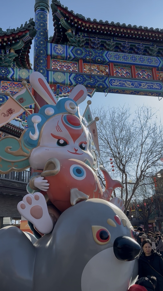 E5PT8HUHAO8D3KM1BK2X - 🌍NewspaperAmigo – Your Global News Buddy 🗞️ Beijing's Qianmen Street Lights Up for Lunar New Year Festivities 🏮✨ video poster