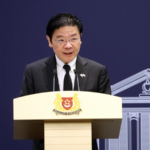 Singapore PM Urges Unity on Total Defence Day Amid Global Tensions 🌏✊