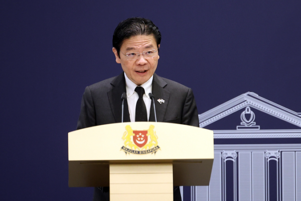 Singapore PM Urges Unity on Total Defence Day Amid Global Tensions 🌏✊