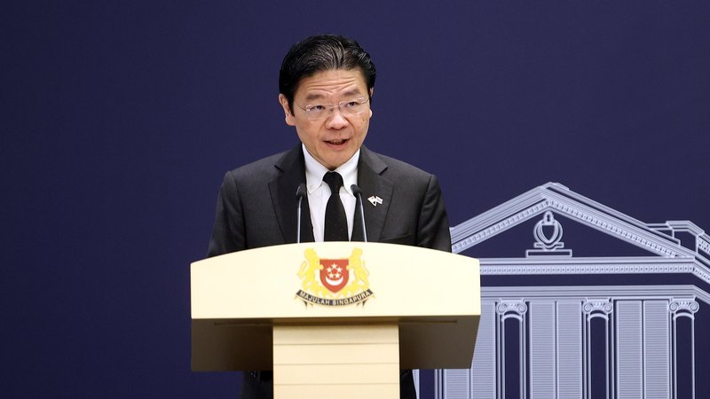 EQF3WKSFVOCBXO38UHEE - 🌍NewspaperAmigo – Your Global News Buddy 🗞️ Singapore PM Urges Unity on Total Defence Day Amid Global Tensions 🌏✊