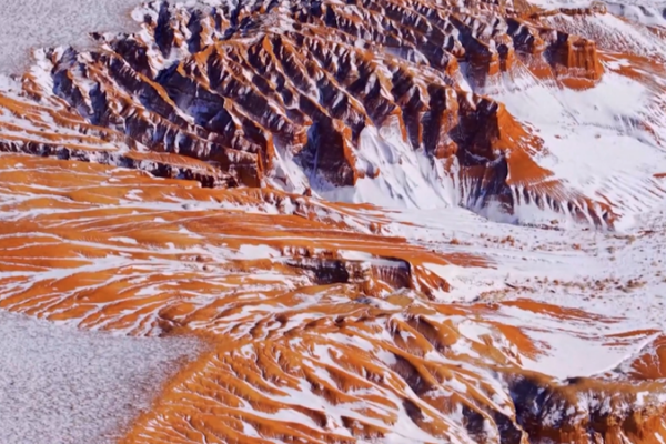 Snow Meets Danxia: Inner Mongolia's Mars-Like Winter Wonderland 🌌❄️ video poster