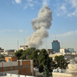 U_S__Israel_Strikes_on_Iran_During_Talks_Spark_Tensions__Journalist_Says