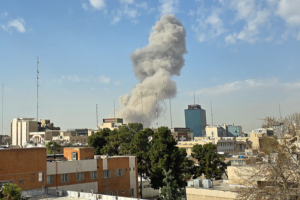 U_S__Israel_Strikes_on_Iran_During_Talks_Spark_Tensions__Journalist_Says