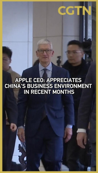 65JMZWIYMG0D4HRZJ0OE - 🌍NewspaperAmigo – Your Global News Buddy 🗞️ Tim Cook Praises China's Business Climate Amid Tech Expansion 🌏📱 video poster
