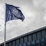 NATO Temporarily Withdraws from Iraq Amid Rising Tensions 🌍✈️