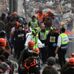 Iranian_Strike_in_Central_Israel_Leaves_11_Missing__9_Dead_in_2026 - 🌍NewspaperAmigo – Your Global News Buddy 🗞️ Iranian_Strike_in_Central_Israel_Leaves_11_Missing__9_Dead_in_2026