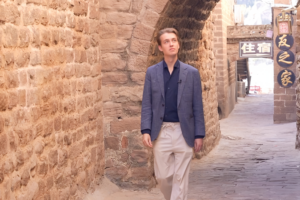 From Screen to Scenery: UK Explorer Rides Movie Train to China’s Qikou 🚄🎬 video poster