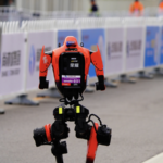 🤖 Beijing Robot Shatters Half-Marathon World Record in Historic Race 🌟 video poster