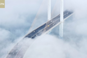 Sky-High Thrills: China's New Cloud Bridge Dares Adventurers 🌉☁️ video poster