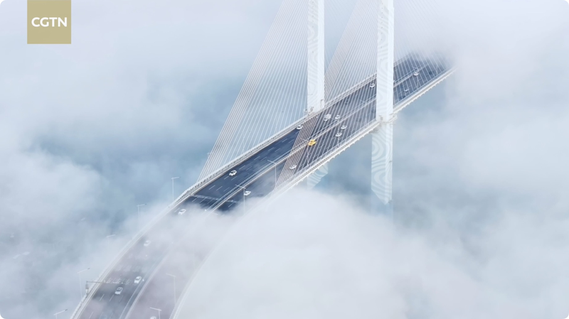 Sky-High Thrills: China's New Cloud Bridge Dares Adventurers 🌉☁️ video poster