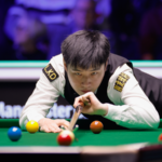 Zhao Xintong Dominates Higgins 10-1, Faces Trump in Tour Championship Final 🎱