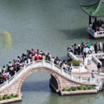 S3DGRQCE2VITOIVZL7BX - 🌍NewspaperAmigo – Your Global News Buddy 🗞️ Qingming Travel Surge: 295M Trips Kick Off 2026 Spring Break 🌸✈️